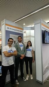 The FAU Team, consisting of Amir Y. Amin, Niall Kilillea and Dimitra Papadopoulo (from left to right) at the LOPEC fair in Munich. (Image: Mrs. Daria Firlus)