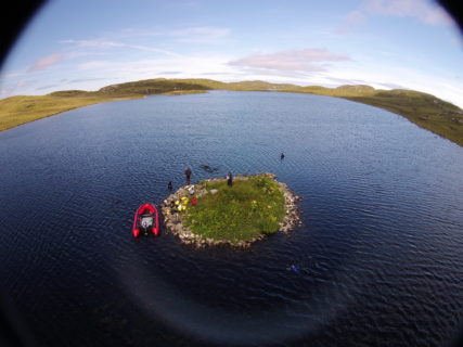 Aerial view of the Neolithic crannog at Loch Langabha. (Image: Fraser Sturt/first published in Garrow, D., & Sturt, F. (2019). Neolithic crannogs: Rethinking settlement, monumentality and deposition in the Outer Hebrides and beyond. Antiquity, 93(369), 664-684. doi:10.15184/aqy.2019)
