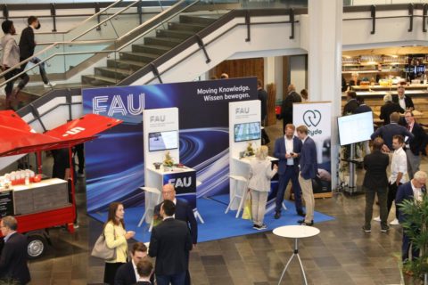 FAU booth that offered space, e.g. for the start-up uRyde to demonstrate their app. (Image: FAU/Kurt Fuchs)