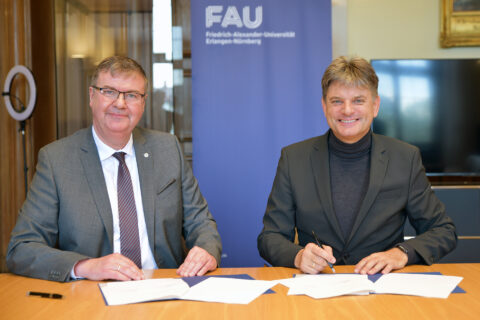 Harald Pickert, President of the Bavarian Office of Criminal Investigation, and Prof. Dr. Joachim Hornegger, President of FAU. (Image: FAU/Boris Mijat)