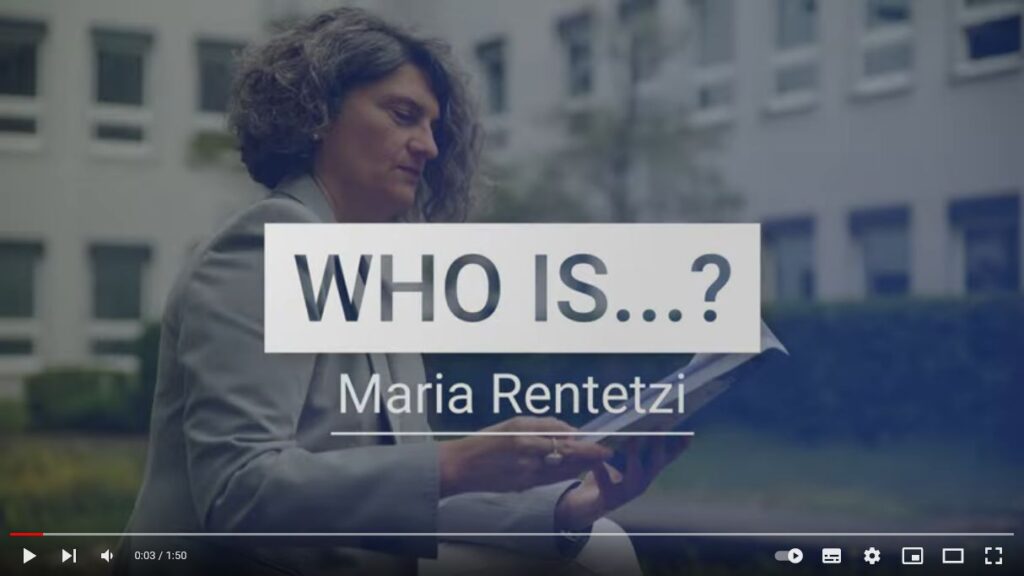 Maria Rentetzi sitting outside with a book