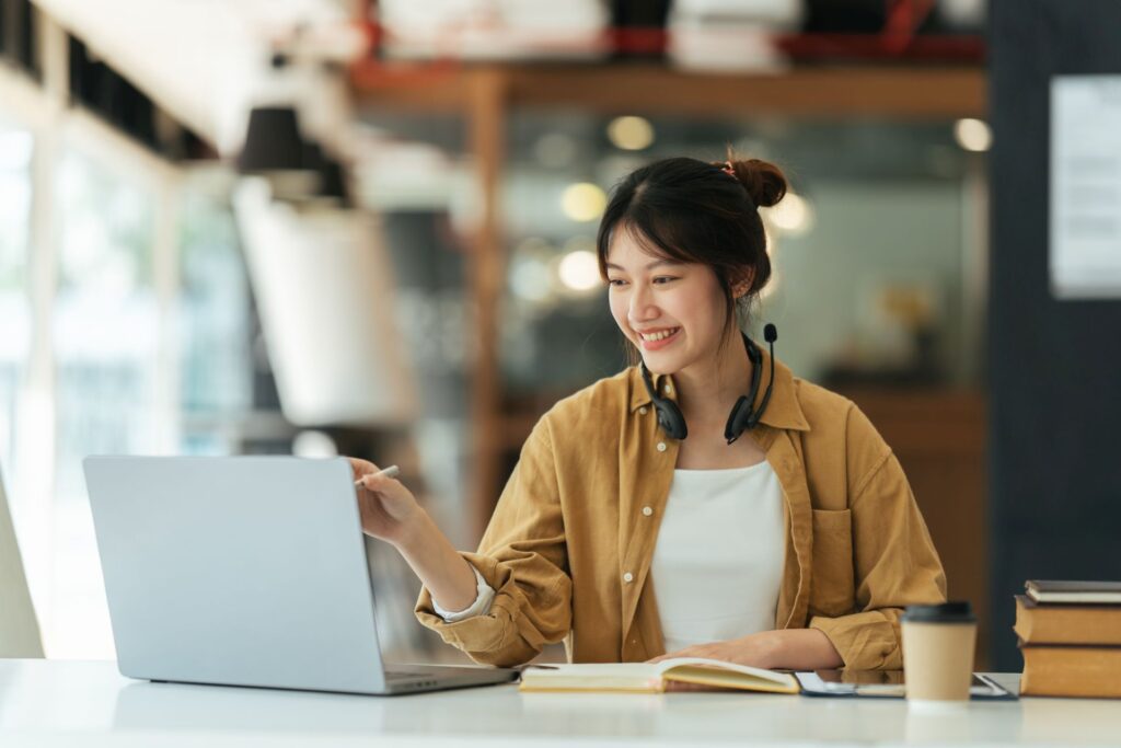 Student in front of laptop.