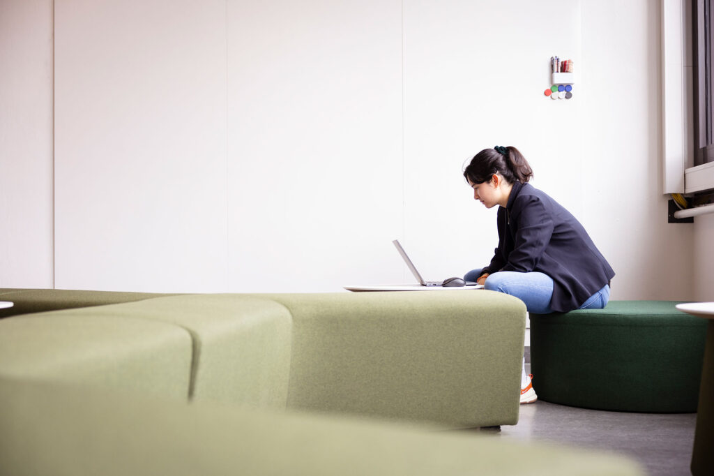 Woman sitting at a laptop