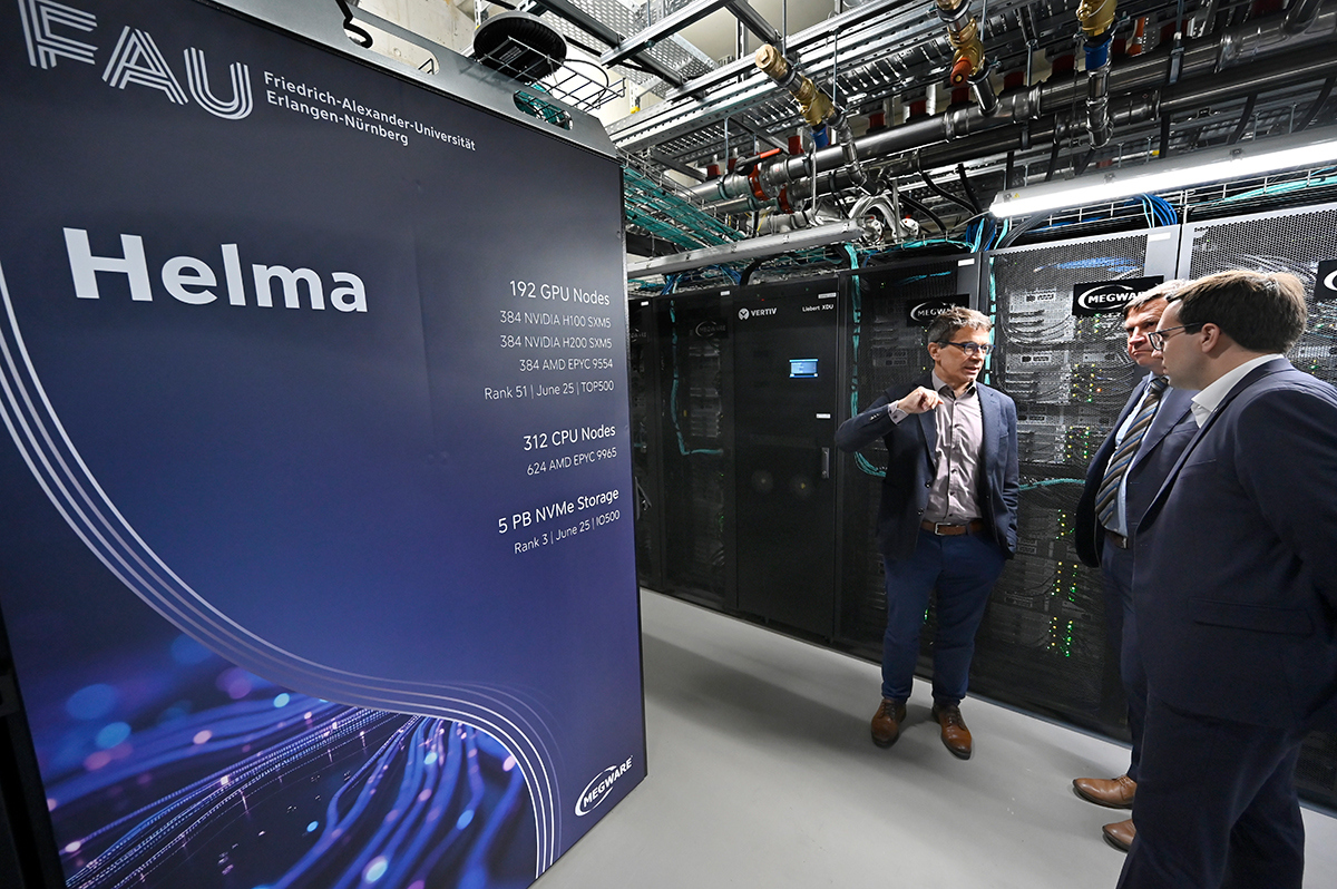 Prof. Wellein explains something to politicians in helma's server room