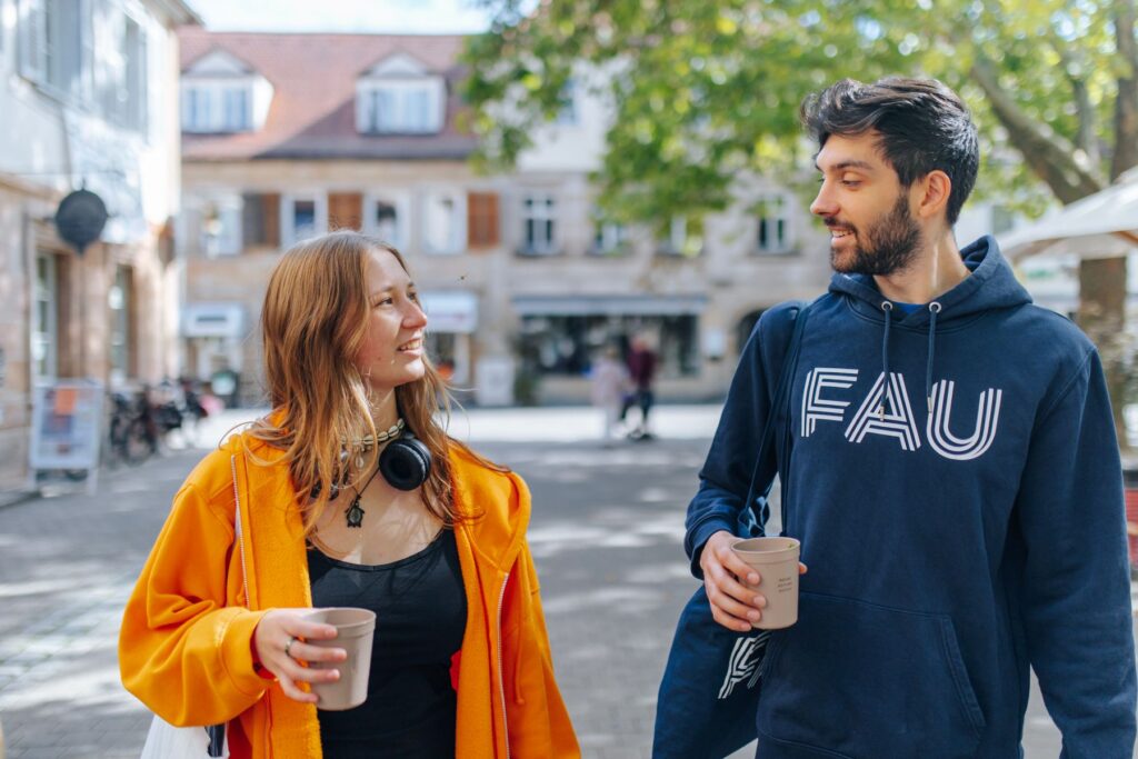 Two students chatting in Erlangen city center