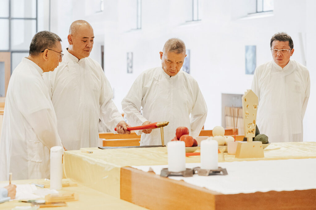 Taoist ritual masters celebrate spirit writing.