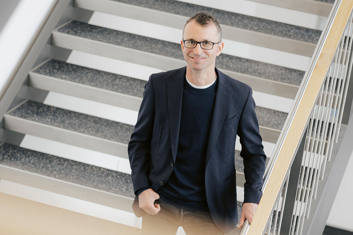 Dr. Wolfgang Wieland is walking down the stairs.