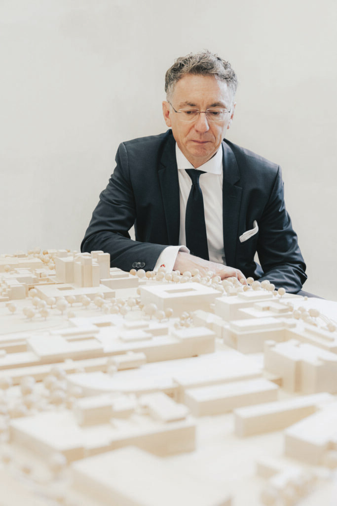 Christoph Safferling looks at a city model.