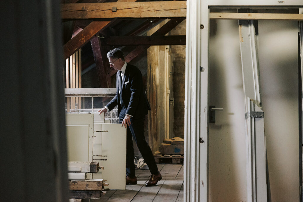 Christoph Safferling looks in an old cupboard.