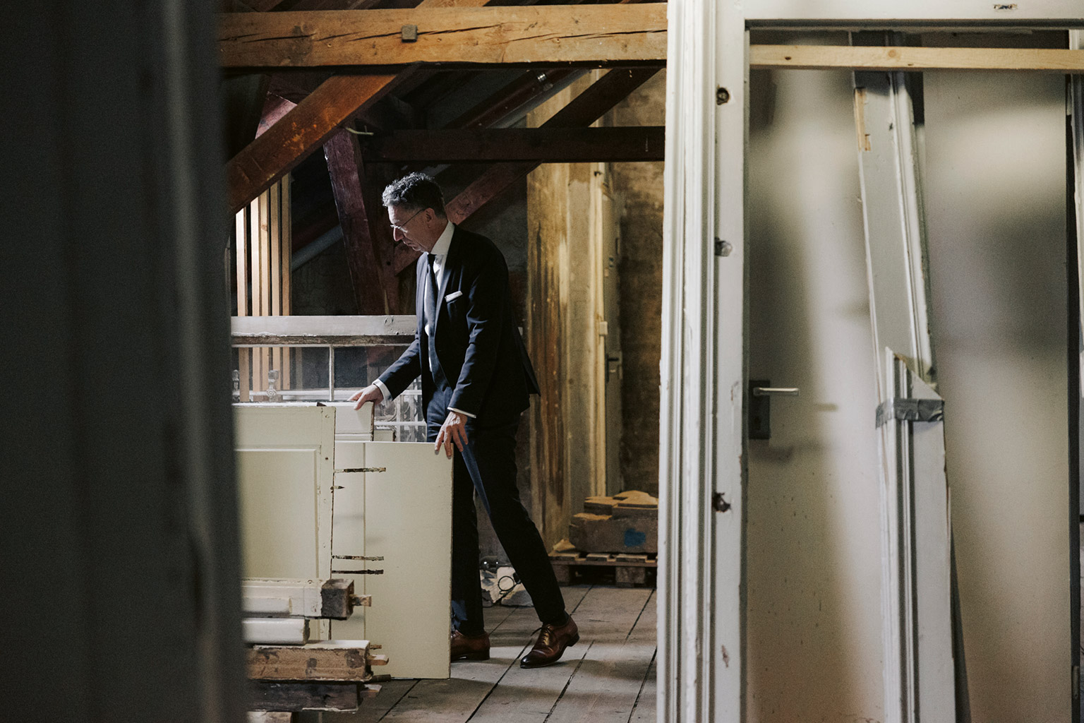 Christoph Safferling looks in an old cupboard.