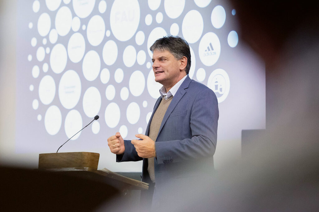 Joachim Hornegger on a stage.