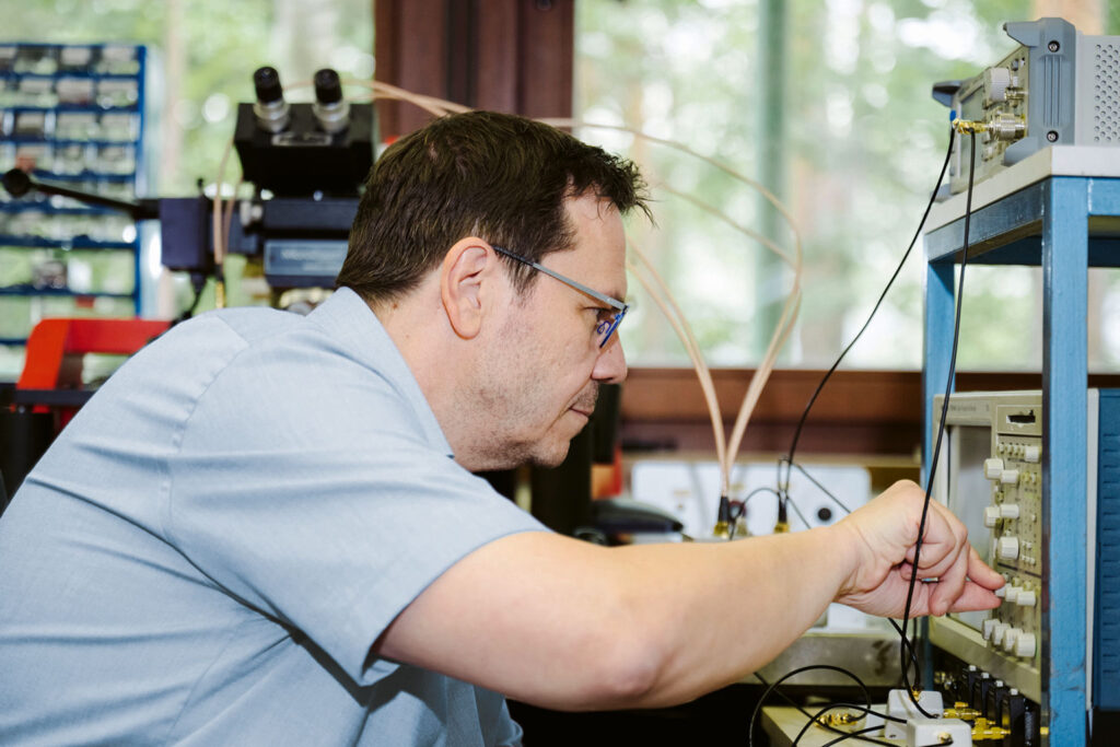 Vojislav Krstić working on a machine.