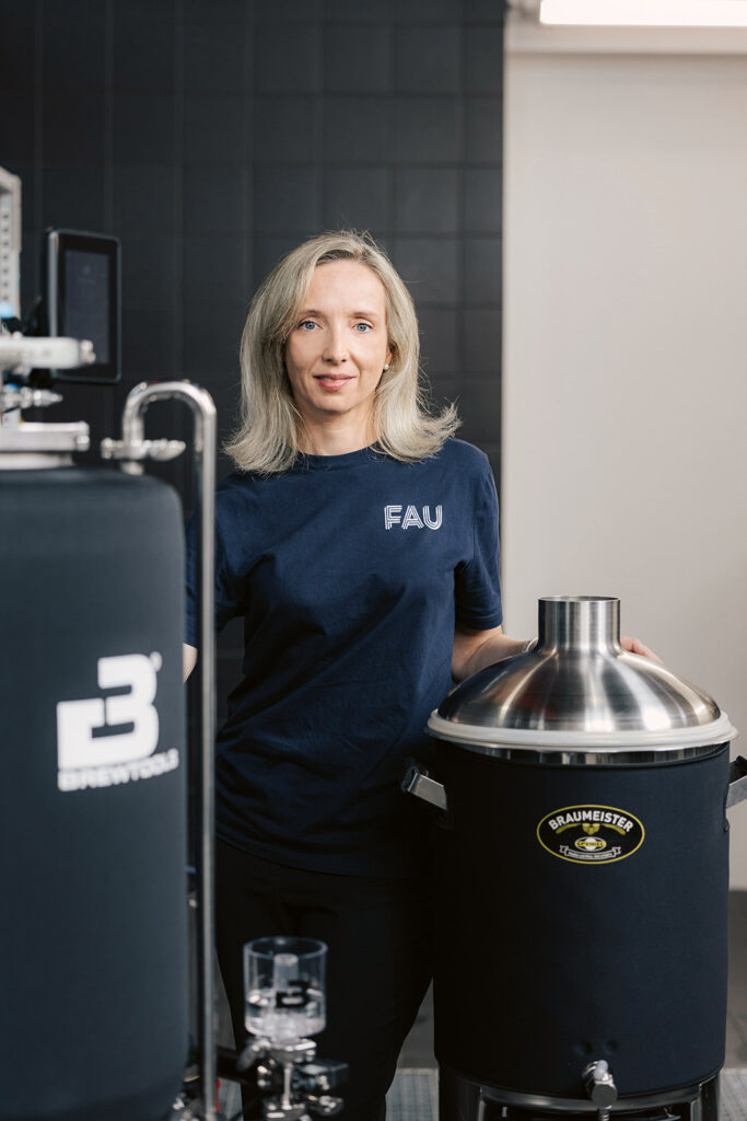 Kathrin Castiglione stands in the brewery.