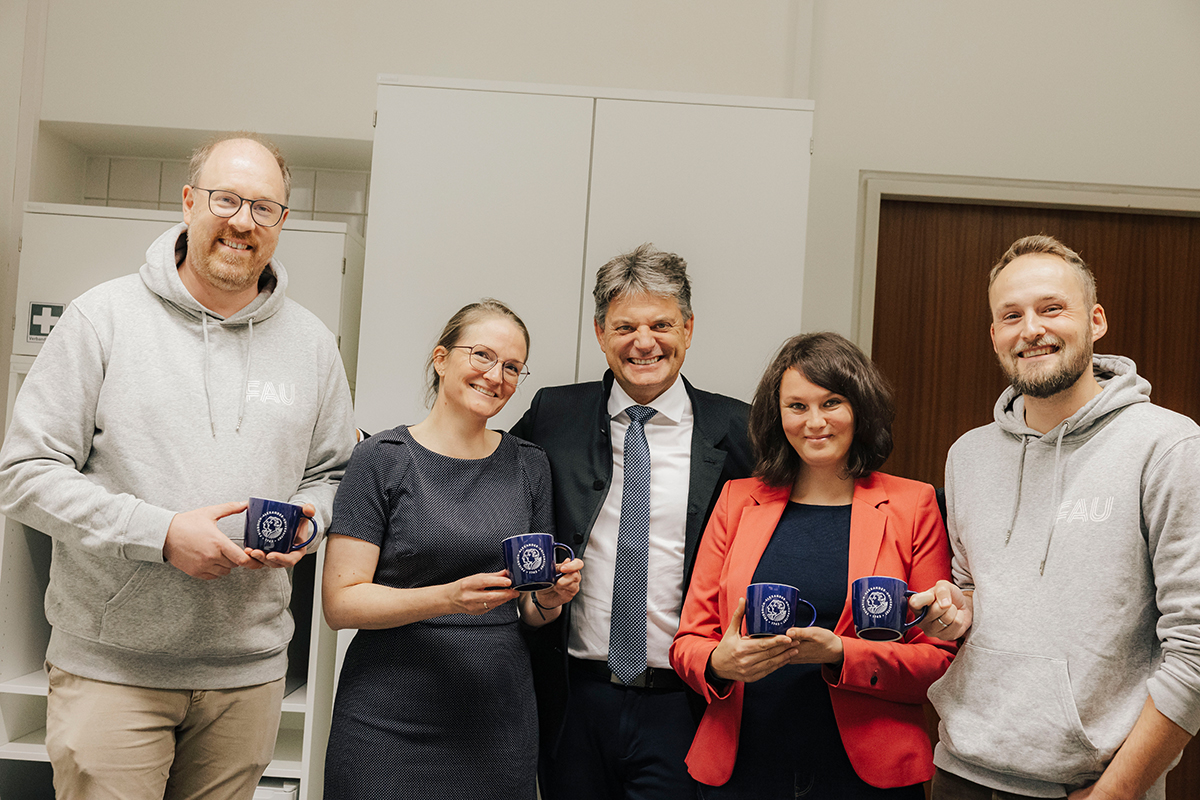 Hornegger and the professors of this episode pose together for a group photo.
