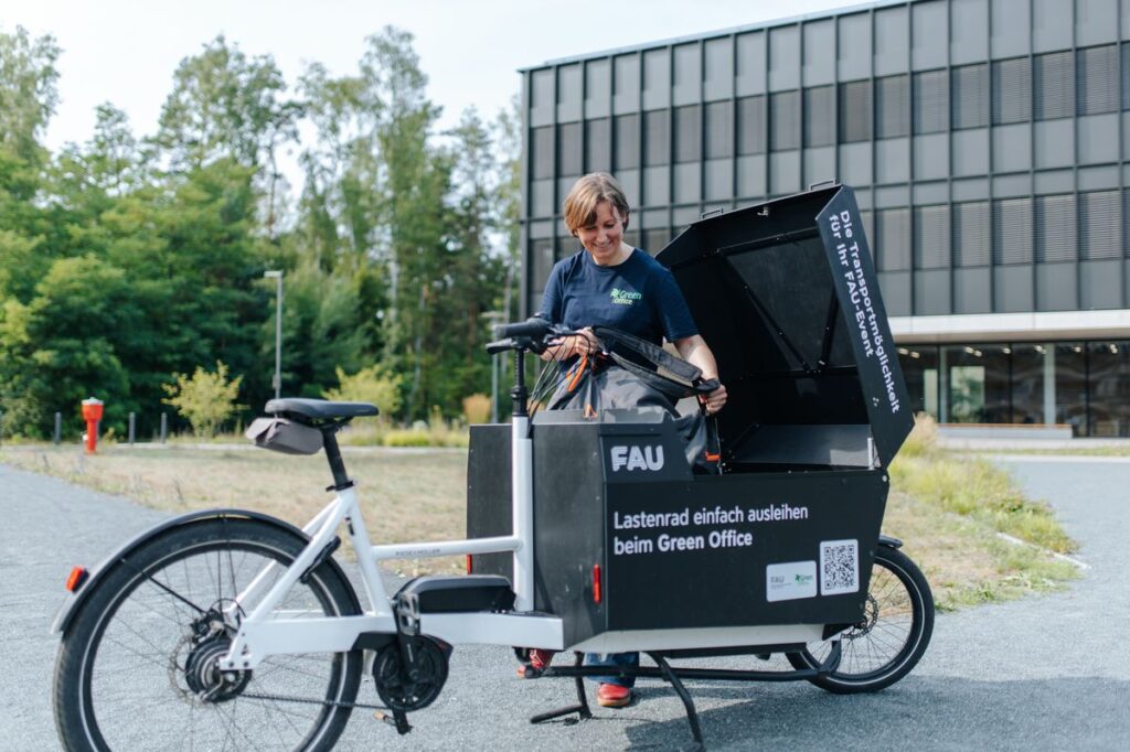 A women and a cargo bike.