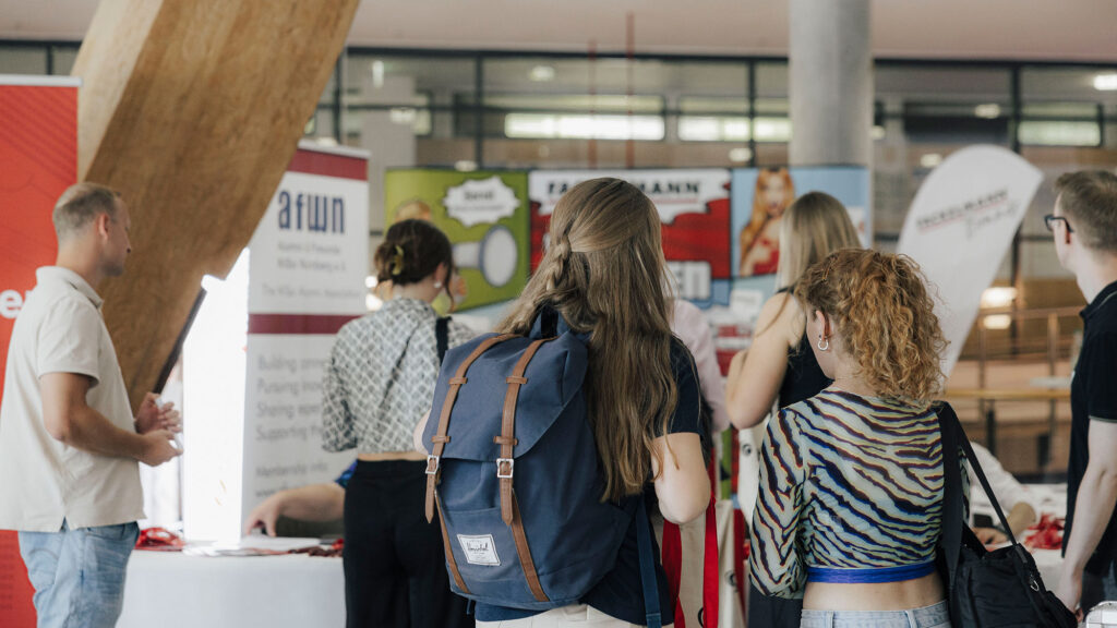 Visitors in an exhibition hall.