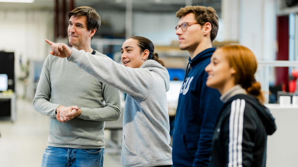 Four scientists and students.