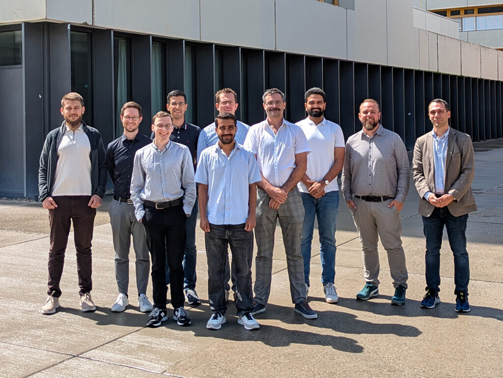 Prof. Dr. Vasileios Belagiannis (right) and his FAU research team.