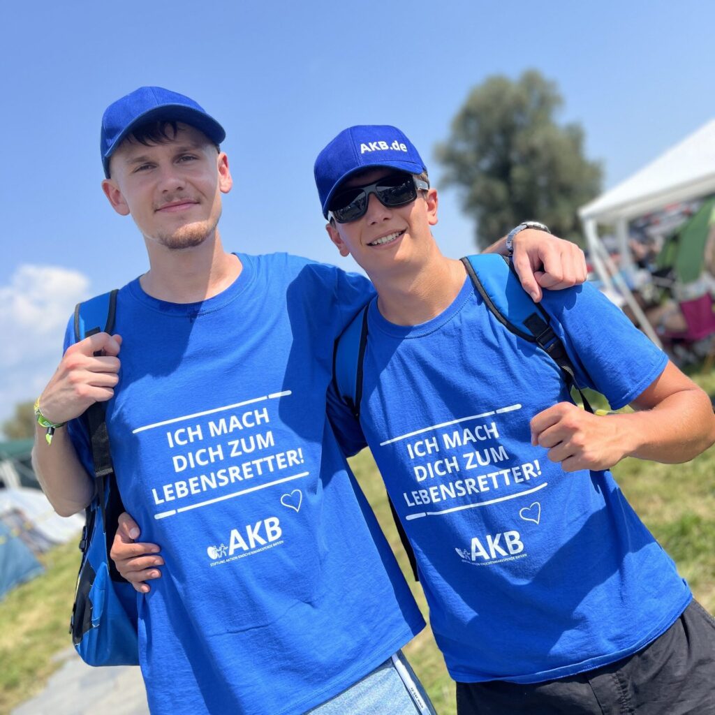 Two young men with blue clothing.